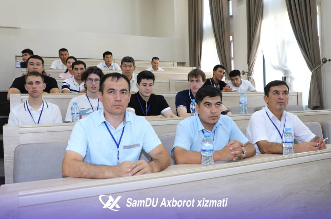 Group photo of summer school participants from multiple countries